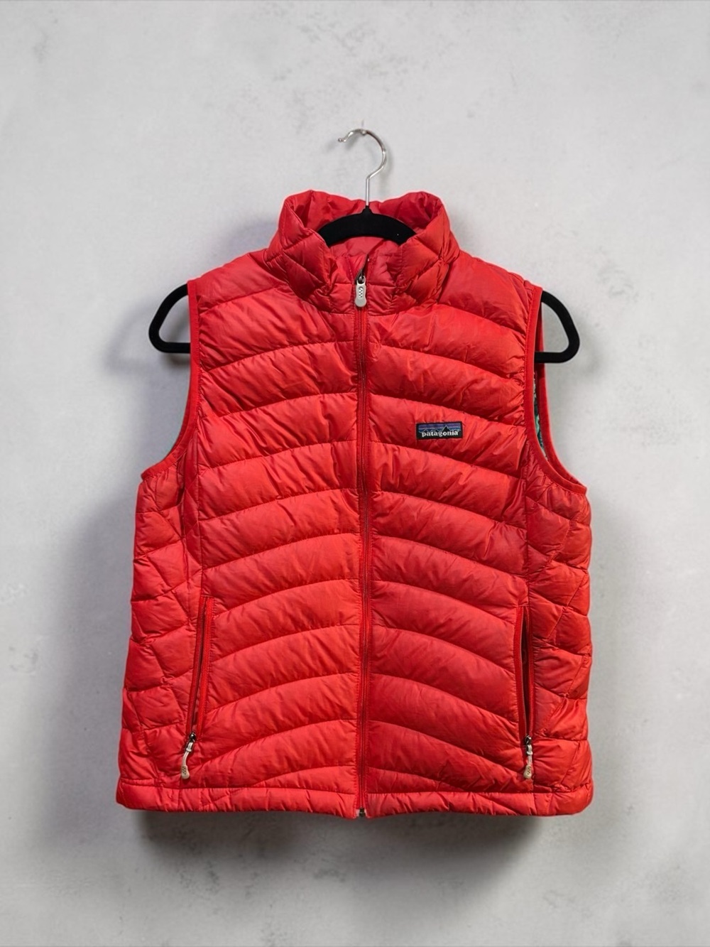 Patagonia Red Quilted Down vest coral red w/teal lining sze L